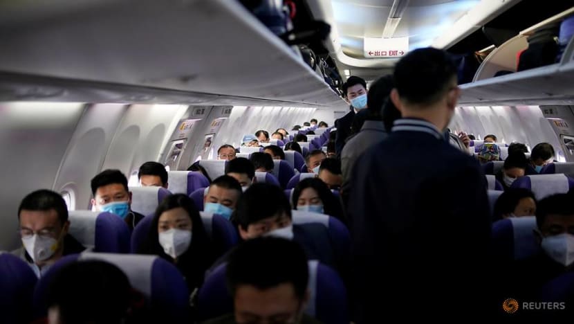 China cuts international flights, bars foreign residents China cuts international flights, bars foreign residents