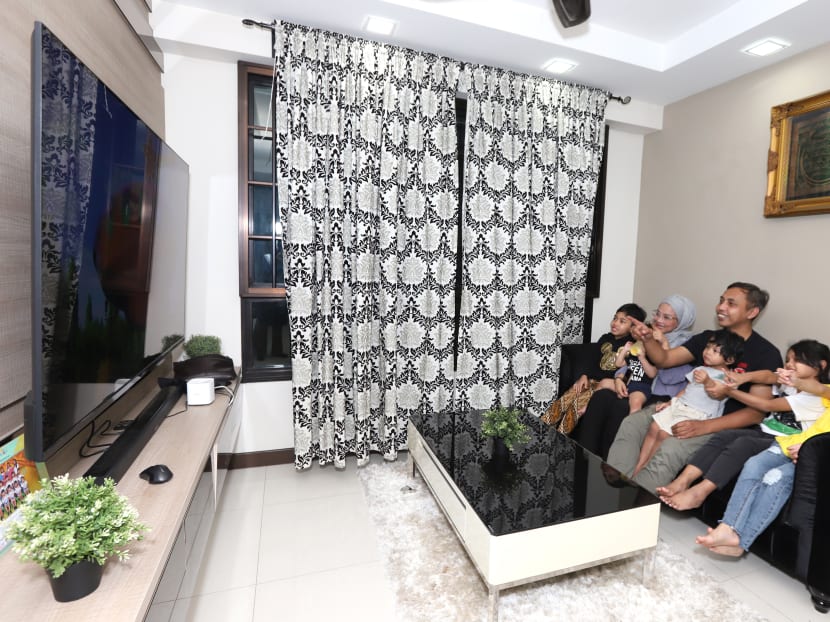 Mr Jumali, 43, his wife and their five children moved into their four-room flat in Punggol in January 2021. The family is among about 4,600 public rental tenants who have moved on to buy their first homes in the last five years, the Housing and Development Board said.