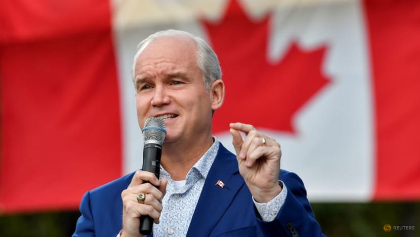 Canada opposition chief, leading in election race, under fire over gun control Canada opposition chief, leading in election race, under fire over gun control