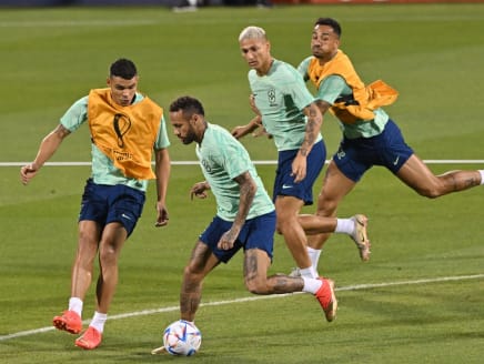 Brazil's forward Neymar (second left) takes part in a training session with teammates at the Al Arabi SC Stadium in Doha on Dec 4, 2022, on the eve of the Qatar 2022 World Cup football match between Brazil and South Korea.
