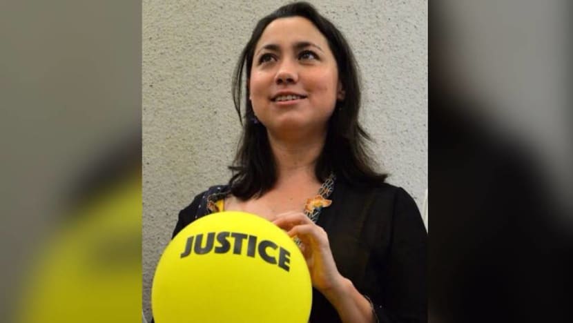 Woman who dropped balloons at event attended by Najib walks free