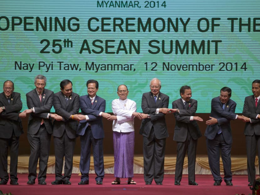 Leaders of Association of Southeast Asian Nations (ASEAN) pose for a group photo during the opening ceremony of the 25th ASEAN summit at Myanmar International Convention Center in Naypyitaw, Myanmar, Wednesday, Nov 12, 2014. Photo: AP
