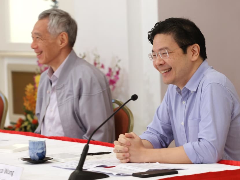Mr Lawrence Wong (right), who will continue as Finance Minister, will be the Acting Prime Minister in the absence of Mr Lee Hsien Loong (left).