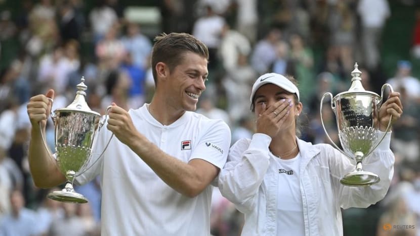 Double delight as Krawczyk and Skupski retain Wimbledon title Double delight as Krawczyk and Skupski retain Wimbledon title