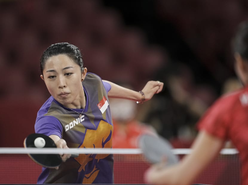 Singapore's Yu Mengyu competes against Japan's Kasumi Ishikawa during their women's singles quarterfinals table tennis match at the Tokyo 2020 Olympic Games at the Tokyo Metropolitan Gymnasium in Tokyo, Japan on July 28, 2021.