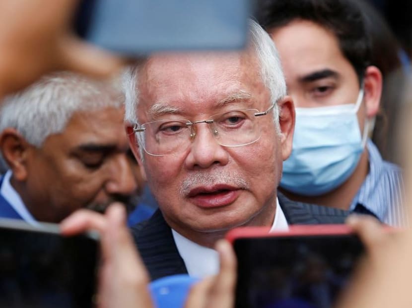 Former Malaysian Prime Minister Najib Razak speaks to journalists outside the Federal Court during a court break, in Putrajaya, Malaysia on Aug 23, 2022.