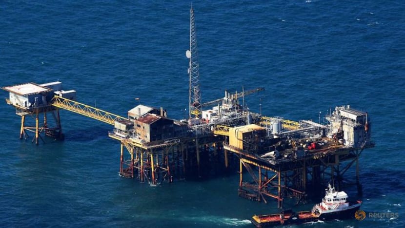 Energy firms shut 13per cent of offshore oil production in US Gulf due to storms Energy firms shut 13per cent of offshore oil production in US Gulf due to storms