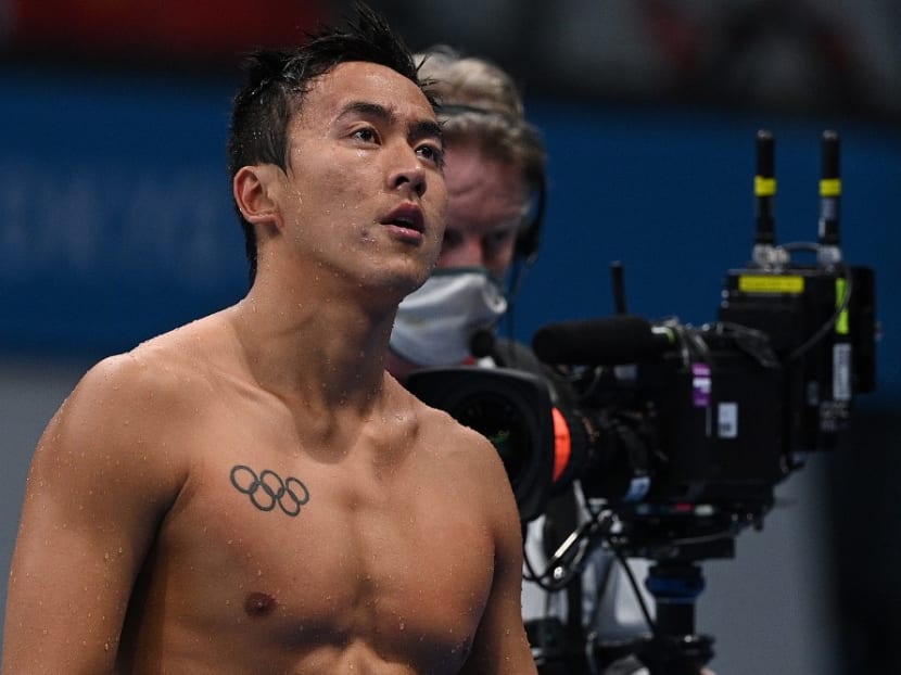 Singapore's Quah Zheng Wen reacts after competing in a heat for the men's 200m butterfly swimming event during the Tokyo 2020 Olympic Games at the Tokyo Aquatics Centre in Tokyo on July 26, 2021.