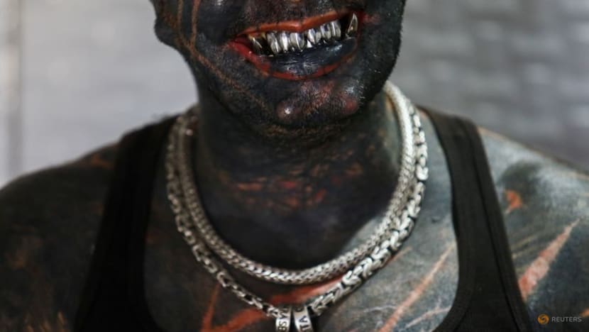 'The sinister attracted me': Brazilian tattoo artist morphs into devil look-alike 'The sinister attracted me': Brazilian tattoo artist morphs into devil look-alike