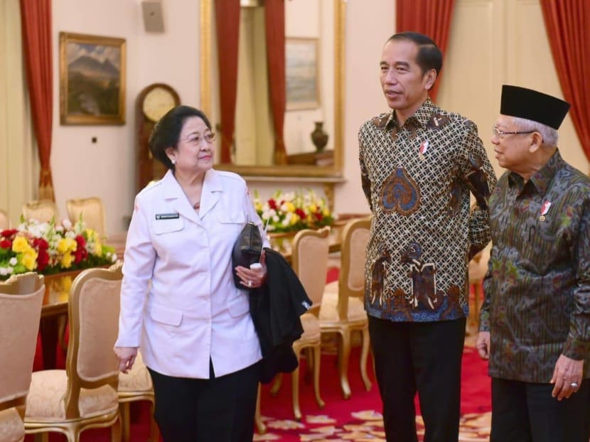 Mr Widodo (centre) with PDI-P chair Megawati Sukarnoputri and Vice President Ma'ruf Amin. Mr Widodo (centre) with PDI-P chair Megawati Sukarnoputri and Vice President Ma'ruf Amin.