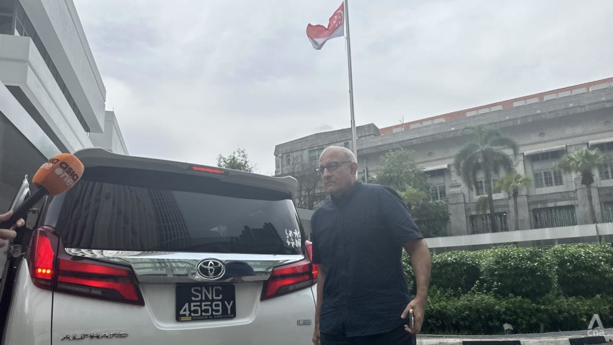 Former transport minister S Iswaran arrives at the State Courts to surrender and begin jail term