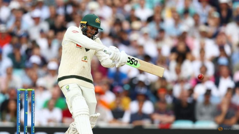Warner and Khawaja hold firm as Australia begin big run chase