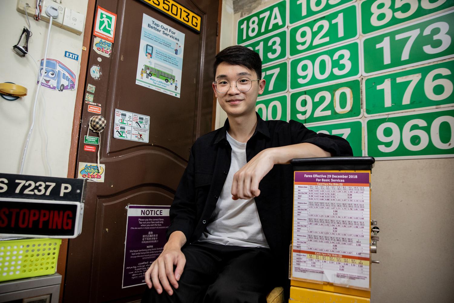 Mr Matthew Tay in his bedroom, which is full of bus memorabilia, on Aug 18, 2022.