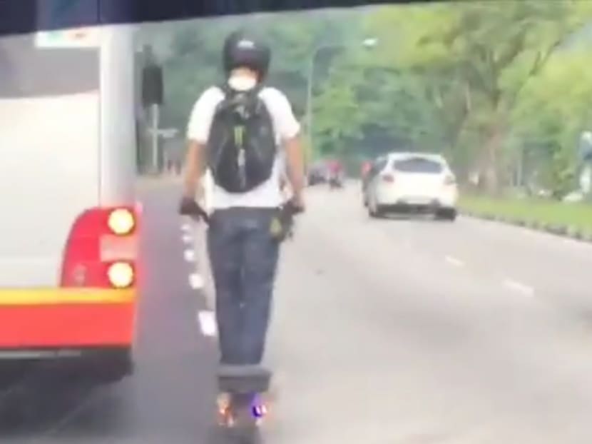 An e-scooter rider is caught on video riding along Mandai Road. Screengrab taken from social media video