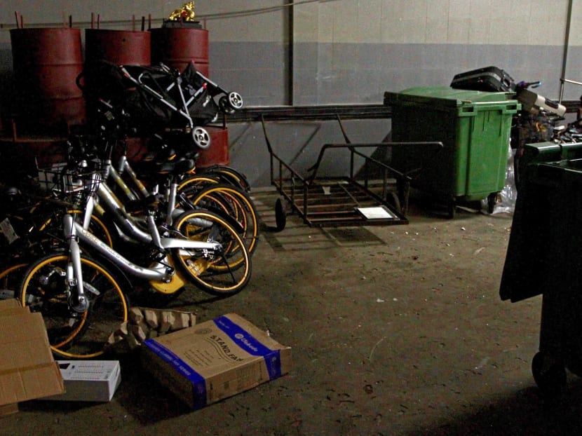oBikes are seen inside a garbage refuse point around the Ang Mo Kio town council district, on July 2, 2018.