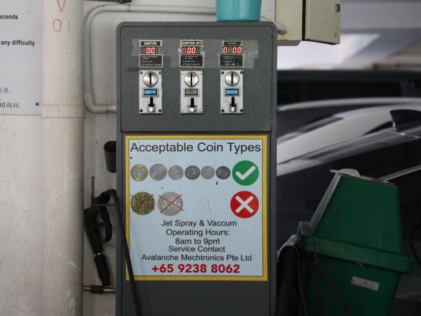 An Avalanche Mechtronics coin-operated water dispenser located at a multi-storey carpark in Yishun, photographed on Jan 19, 2023.