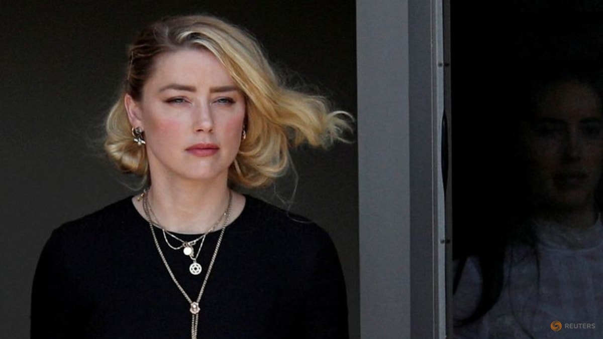 Amber Heard akan menyelesaikan kasus pencemaran nama baik dengan mantan suaminya Johnny Depp