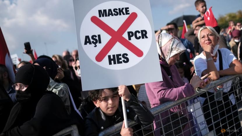 Thousands protest new Turkish COVID-19 vaccine and test rules Thousands protest new Turkish COVID-19 vaccine and test rules