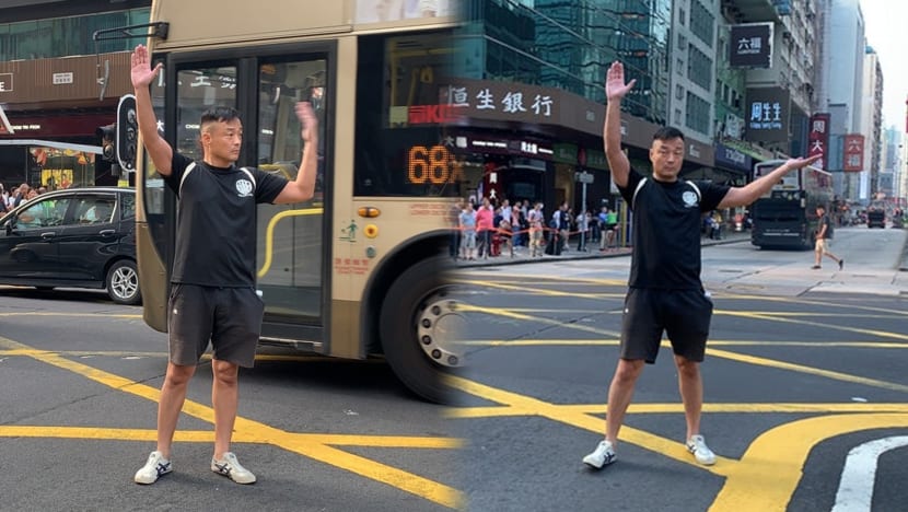 HK actor Wong He directs traffic in Mongkok for two hours