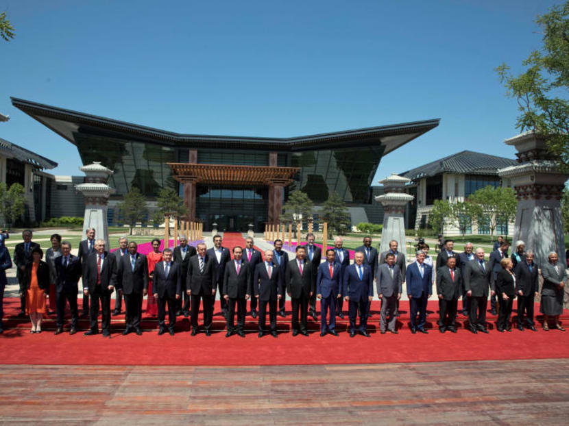 Leaders attending the Belt and Road Forum pose for a group photo at the Yanqi Lake venue on the outskirt of Beijing on May 15, 2017. Photo: Reuters