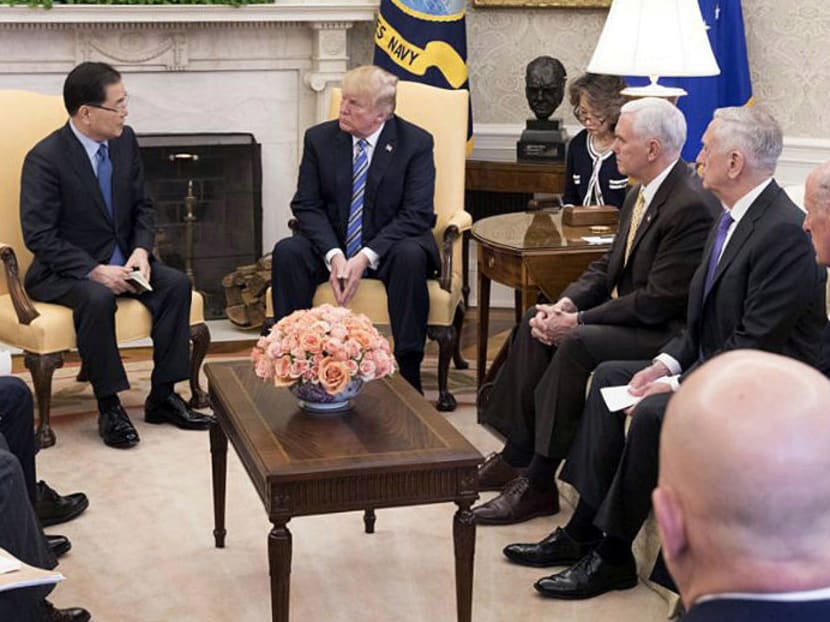 South Korea's national security chief Chung Eui-yong briefs US President Donald Trump at the Oval Office about his visit to North Korea. Mr Trump’s sudden ousting of Secretary of State Rex Tillerson could delay critical elements of a plan to meet with Kim Jong-un of North Korea. Photo: Yonhap via Reuters