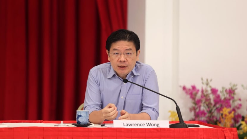 Singapore needs a strong, united team to overcome challenges, says Lawrence Wong
