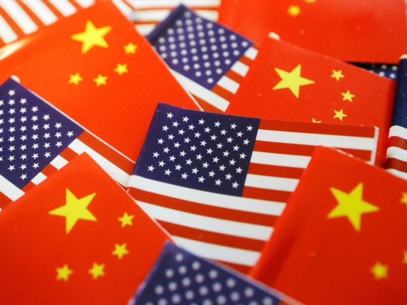 FILE PHOTO: Flags of U.S. and China are seen in this illustration picture taken August 2, 2022. REUTERS/Florence Lo/Illustration