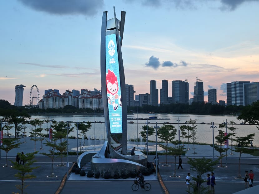The Sea Games 2015 cauldron seen at dusk with the Singapore Skyline in the background. Photo: Don Wong/TODAY