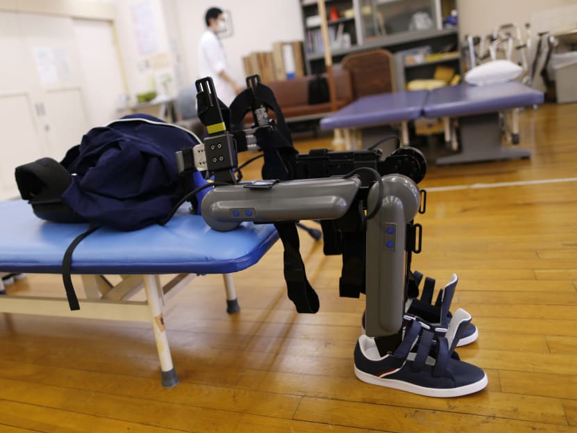 Exoskeleton that helps paralysed walk faces barrier in Japan