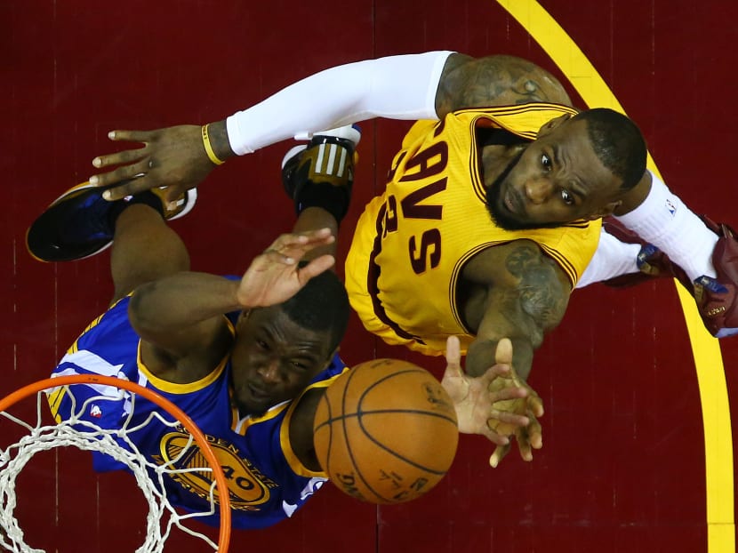 LeBron James #23 of the Cleveland Cavaliers goes up against Harrison Barnes #40 of the Golden State Warriors in the second half during Game Four of the 2015 NBA Finals at Quicken Loans Arena on June 11, 2015 in Cleveland, Ohio. Photo: Getty Images