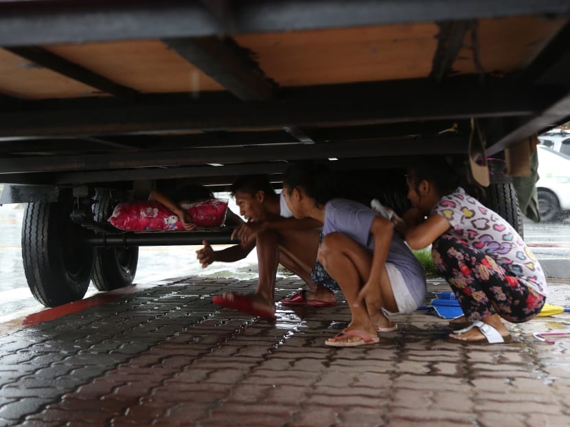 Gallery: Storm causes floods, knocks out power in north Philippines
