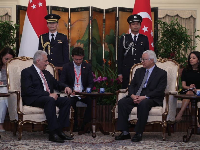 Turkey's Prime Minister Binali Yildirim meets with President Tony Tan during his visit to Singapore, where he said he plans to focus ‘more on this part of the world’. Photo: MCI