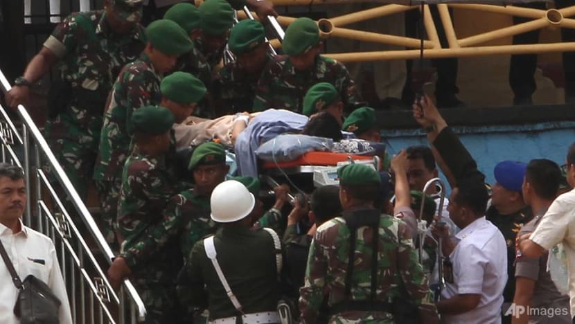 Indonesia arrests two dozen people after knife attack on security minister Wiranto Indonesia arrests two dozen people after knife attack on security minister Wiranto