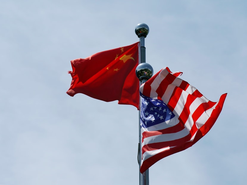 Chinese and US flags flutter near The Bund before US trade delegation meet their Chinese counterparts for talks in Shanghai, China on July 30, 2019.