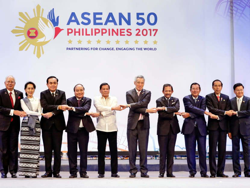 Association of Southeast Asian Nations (ASEAN) leaders link arms during the opening ceremony of the 30th ASEAN Summit in Manila, Philippines April 29, 2017. Photo: Reuters