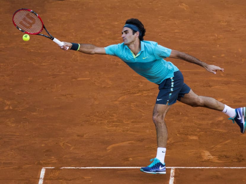 Roger Federer from Switzerland returns the ball during his Madrid Open tennis tournament match against Nick Kyrgios from Australia in Madrid, Spain. Photo: AP