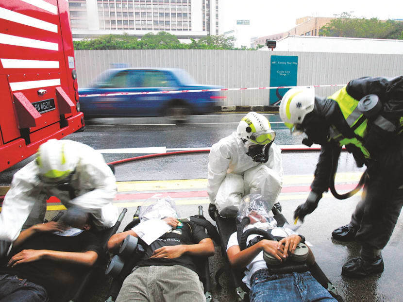 SCDF officers at work at multi-agency civil emergency exercise.