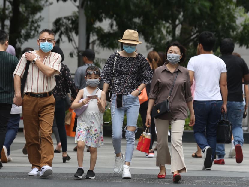 Pedestrians wearing masks on Orchard Road on Jan 29.
