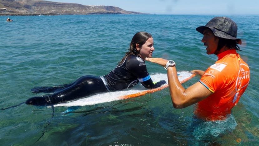Surfing-Amputee surfer making waves in the sport