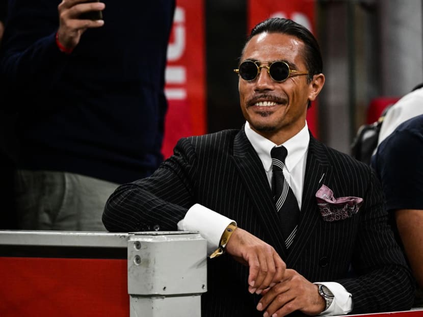 Turkish butcher, chef, food entertainer and restaurateur, Nusret Gokçe, nicknamed Salt Bae, attends the Italian Serie A football match between AC Milan and Napoli on Sept18, 2022 at the San Siro stadium in Milan.
