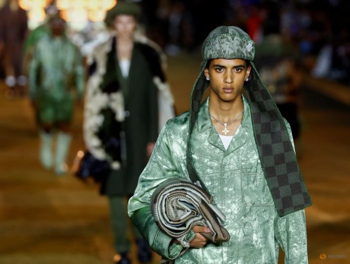 A model wears a creation of Louis Vuitton Men's fashion Spring
