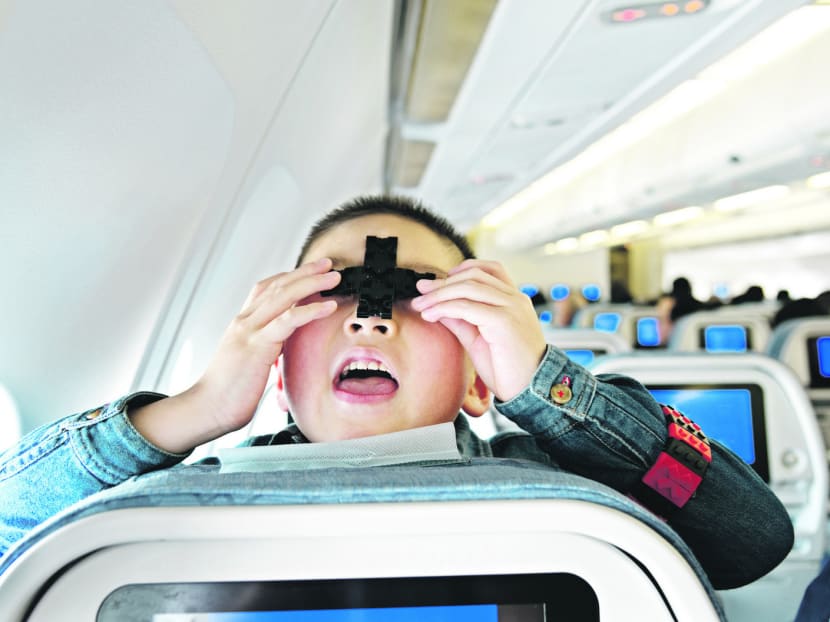 Gallery: 8 ways to survive long-haul flights with kids