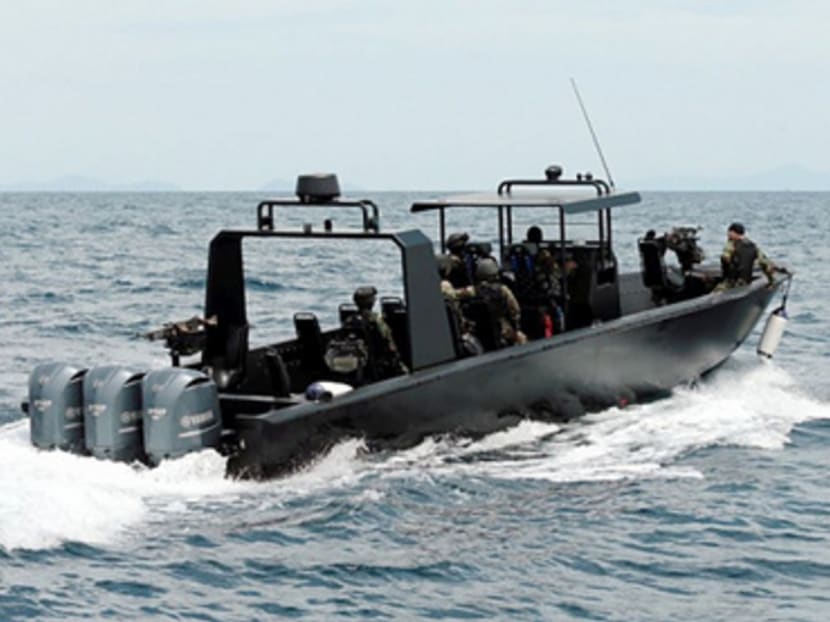 Security forces patrolling the waters off Semporna, along the Philippine-Malaysian border after four Malaysian sailors were kidnapped there last week. Security experts say a military solution is needed to deal with such threats. Photo: Malay Mail