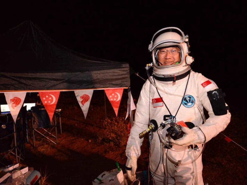 Marvyn Lim Seng, pictured in his space mission gear in the central Australian desert, has vowed to continue with the quest to put the first Singaporean into space.