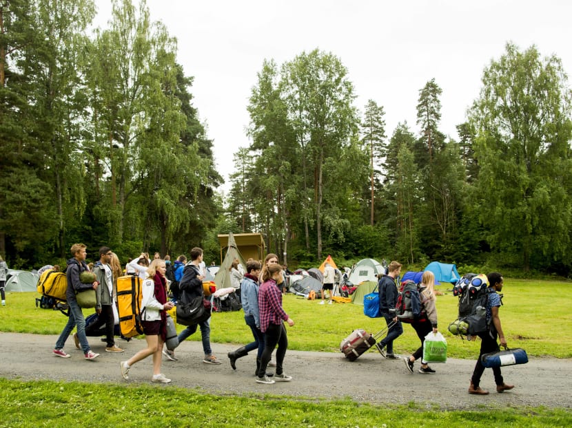 Young people arrive to camp at Utoya Island in Norway on Aug 6. Photo: NTB Scanpix via AP