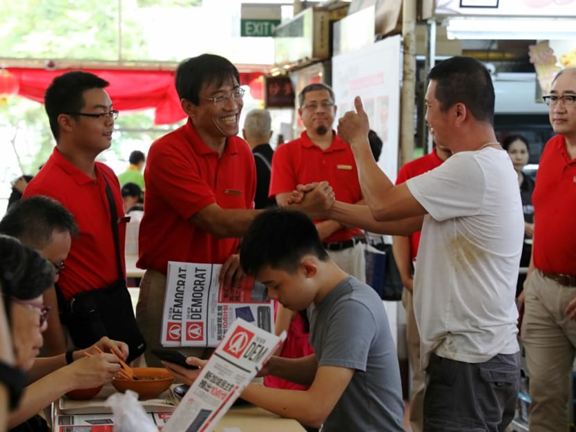A Singapore Democratic Party walkabout at Bukit Timah Food Centre earlier in January this year. Several opposition parties are restarting their walkabouts and house visits this weekend, including on Friday — the same day Singapore moves into the second phase of its circuit breaker exit.