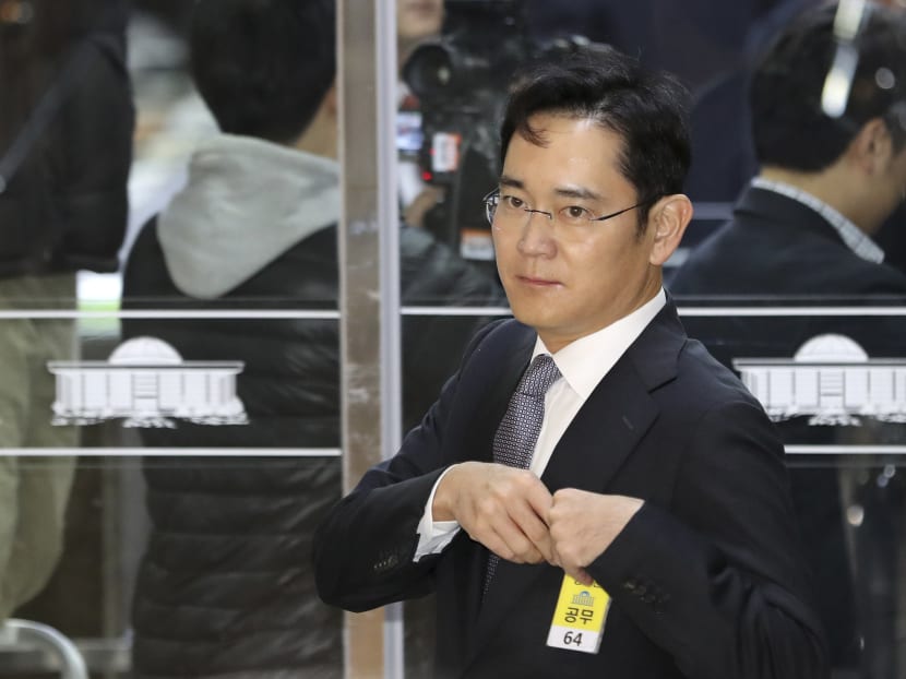 Mr Lee Jae-yong, a Vice Chairman of Samsung Electronics, arrives for hearing at the National Assembly in Seoul, South Korea, on Dec 6, 2016. Photo: AP