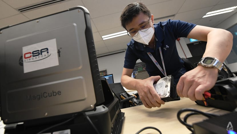 In CSA's forensics lab, officers dissecting cyberattacks use sophisticated gadgets and race against time