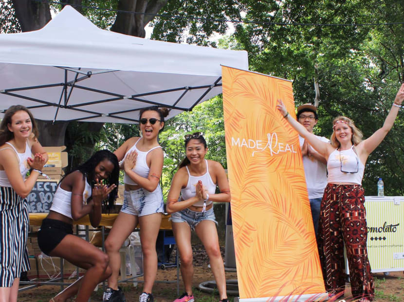 The author (fourth from the left) and Made Real co-founder Robin (fifth from the left) at a music festival booth in 2017 where they sold snacks.