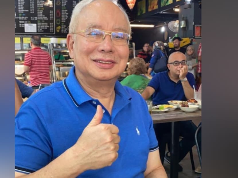 Former Malaysian prime minister Najib Razak posted this thumbs-up picture that was tagged as a gesture of satisfaction with a restaurant meal, but many Malaysians saw it as a bigger sign of happiness that the return of his party would affect the handling of high-profile corruption trials.